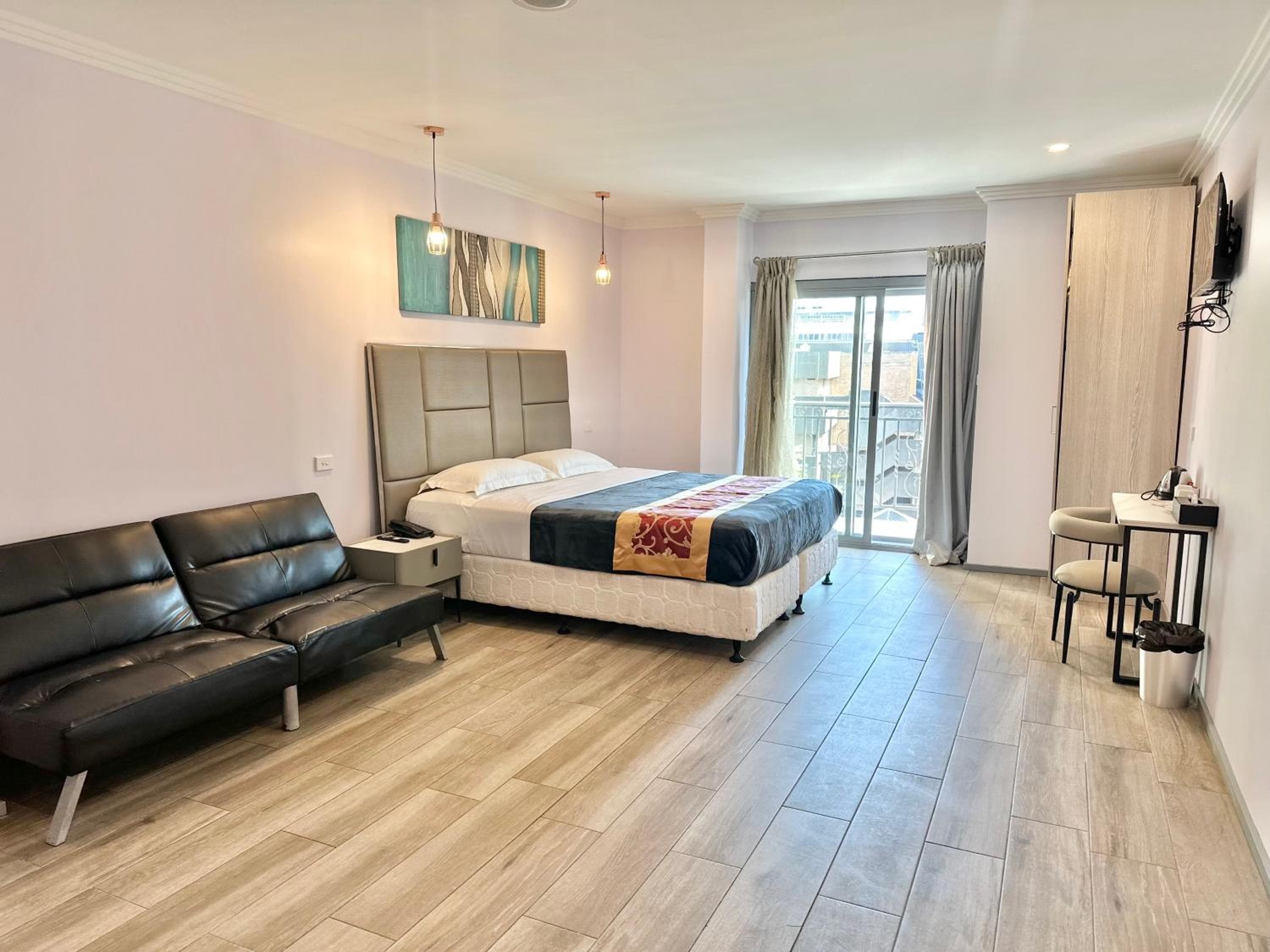 Premium King Room with Balcony - Non-Smoking